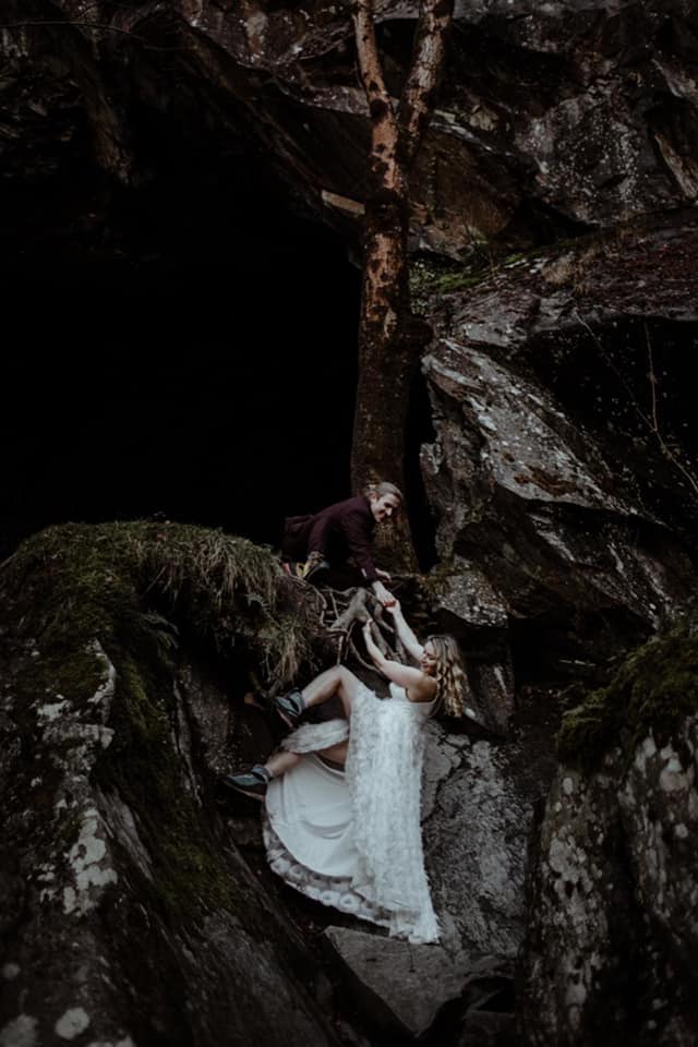 Climbing bride in the Lake District in England