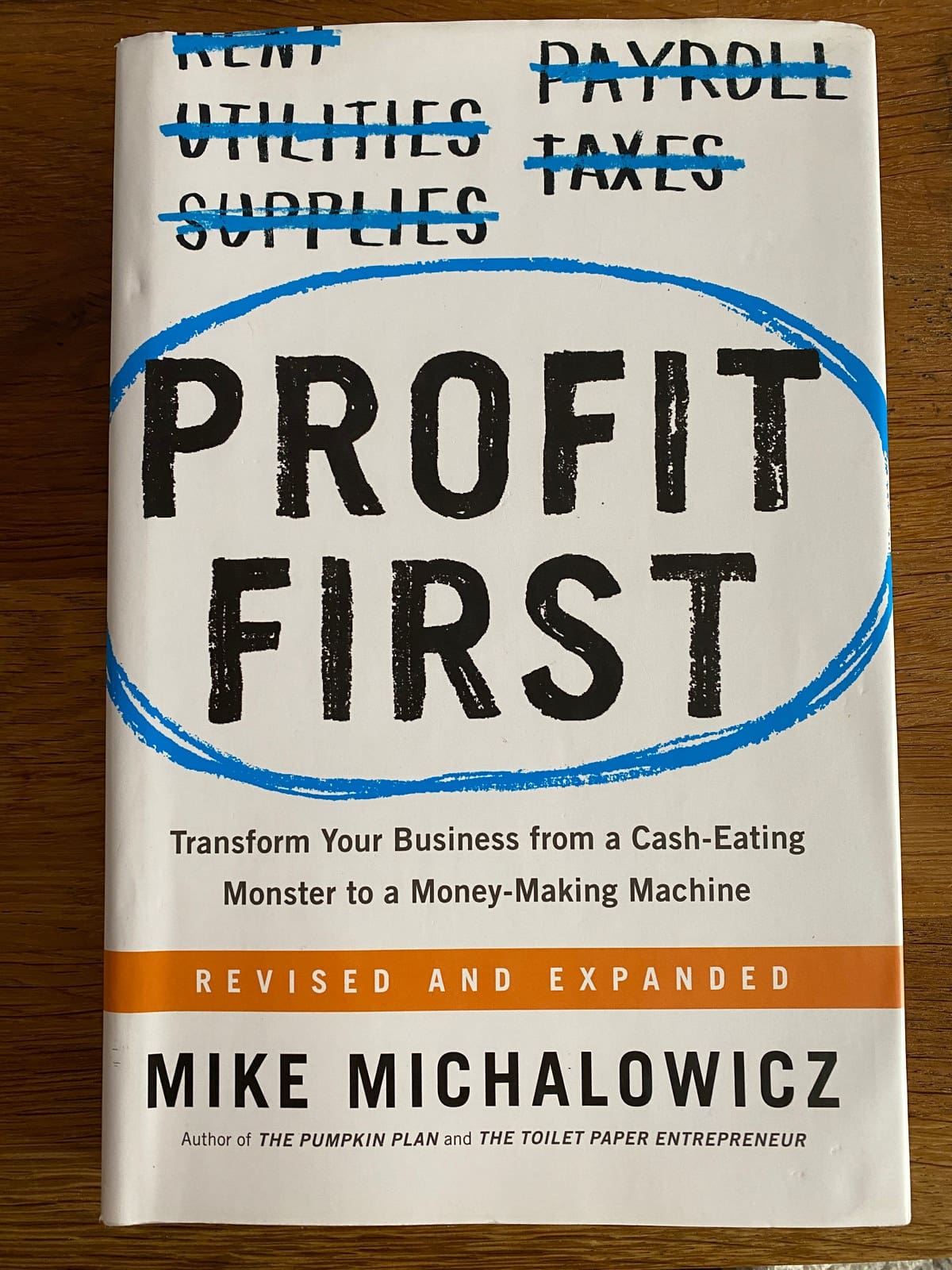 Profit First is an essential business book for photographers looking to be financial secure